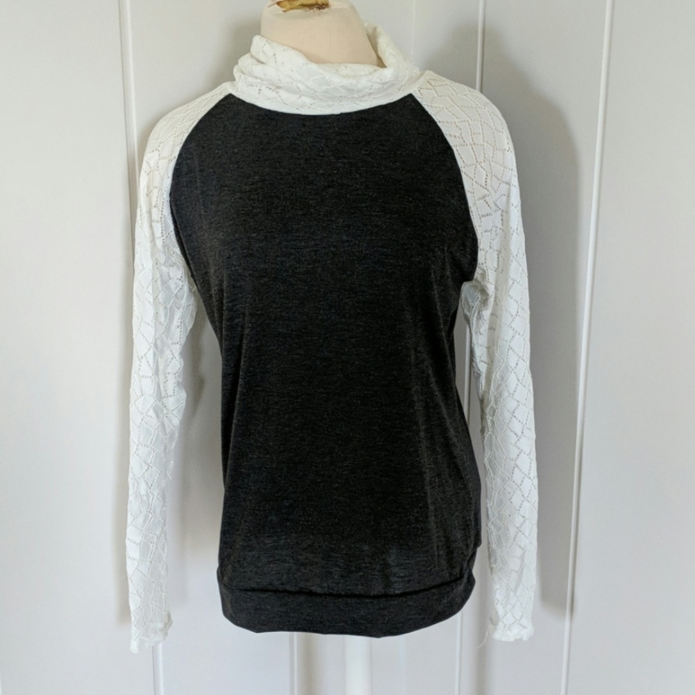 Dark gray and white long sleeved top